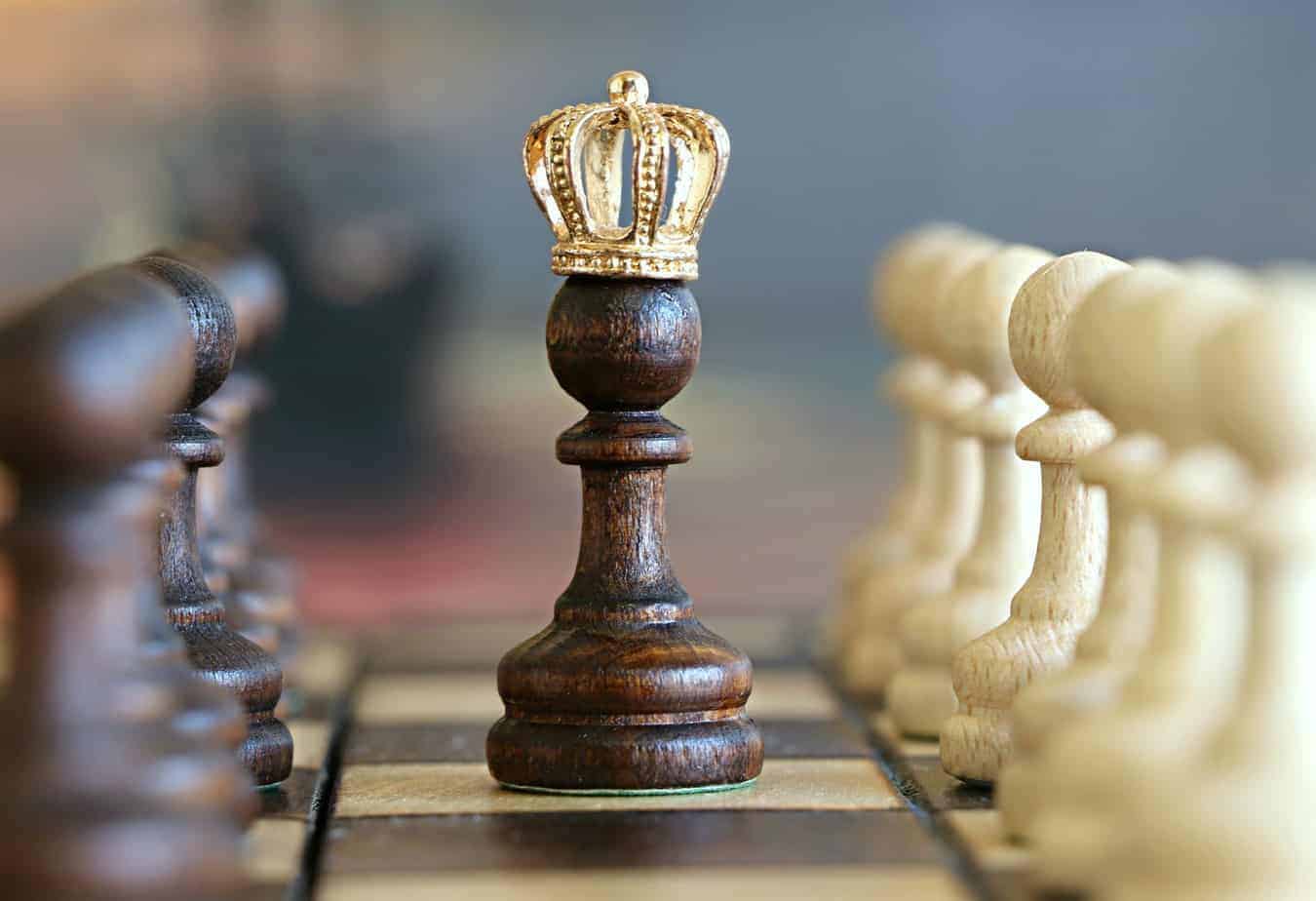 A pawn with a crown - humble beginnings leading to greatness